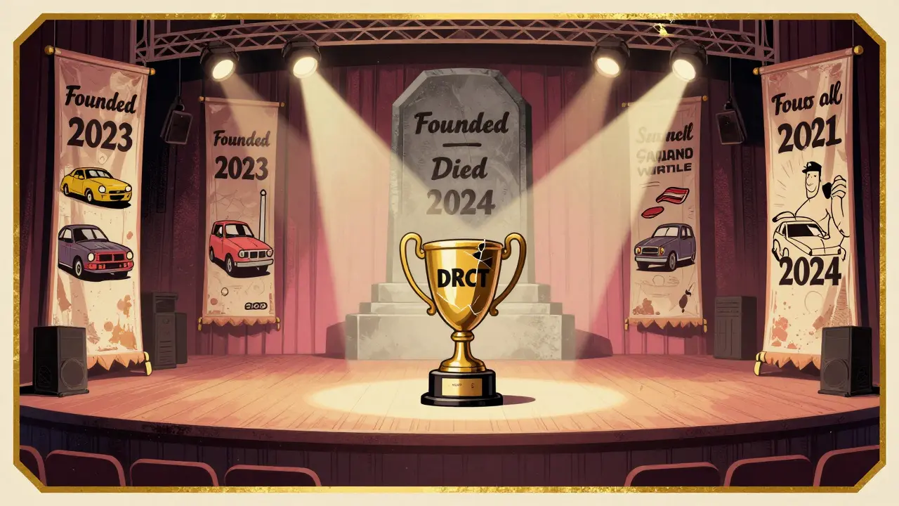 Empty stage with a cracked DRCT trophy and a tombstone marked 'Founded 2023 - Died 2024'.